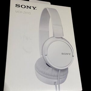 Sony over ear white wired headphones. New in sealed box